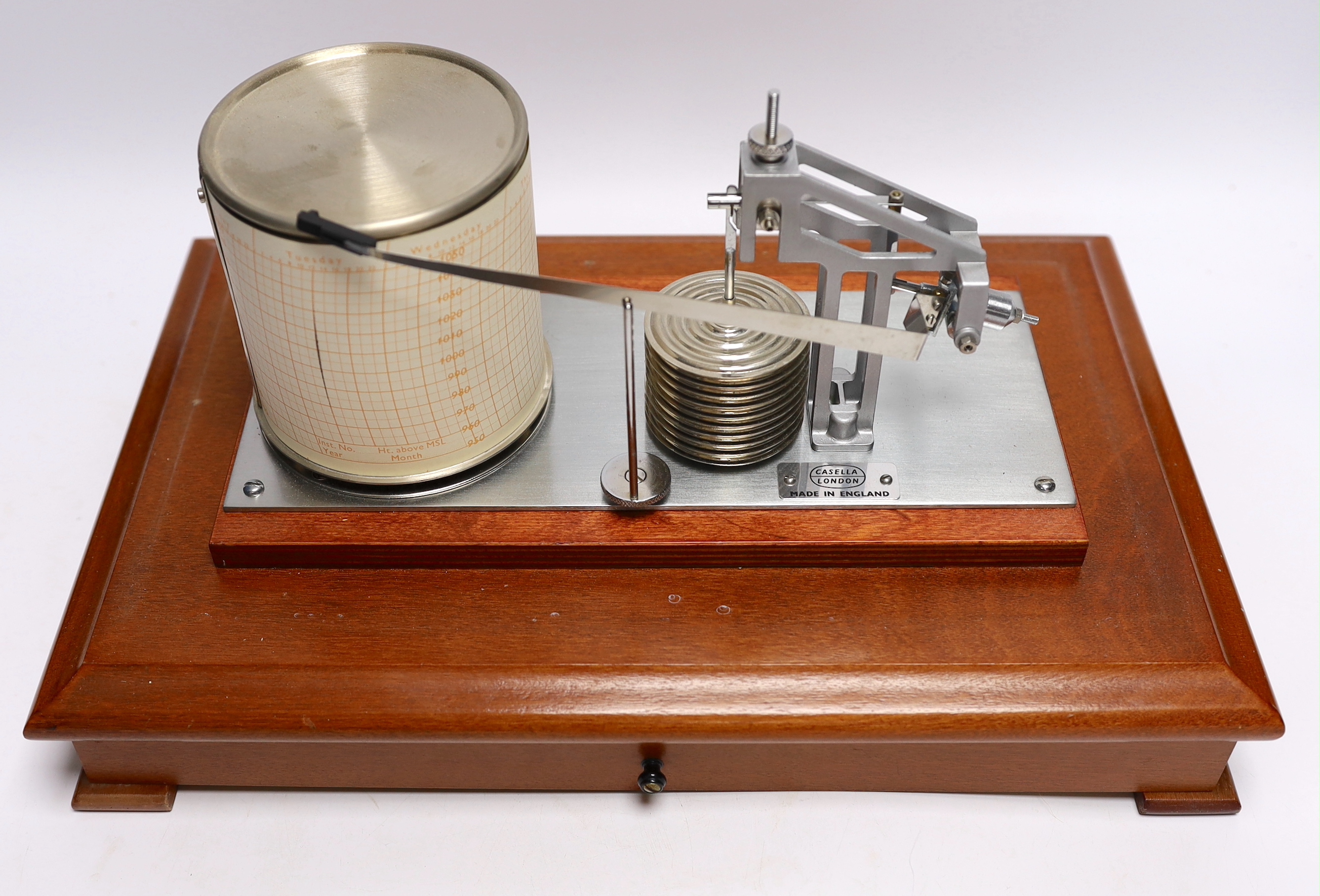 A modern 1980s barograph by Casella in a teak case with bevelled glass panels and incorporating a drawer with spare graph papers, 37cm x 24cm